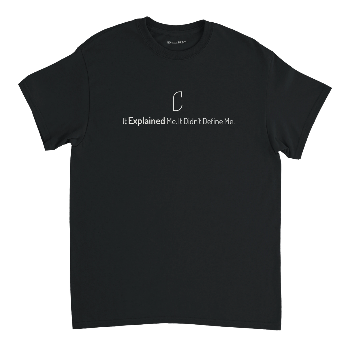 T-shirt printed with the phrase "It Explained Me. It Didn't Define Me." in restrained typography, with a small open-bracket icon above the text.
