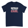 Front of a T-shirt with the Details Are How I Care design in berry and porcelain typography with small detail marks